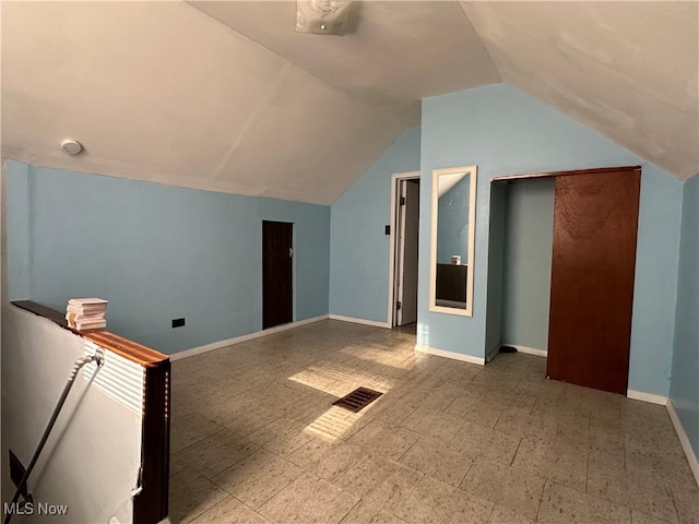 4011 E 29th St, Newburgh Heights, OH 44105 - additional living space featuring vaulted ceiling and baseboards