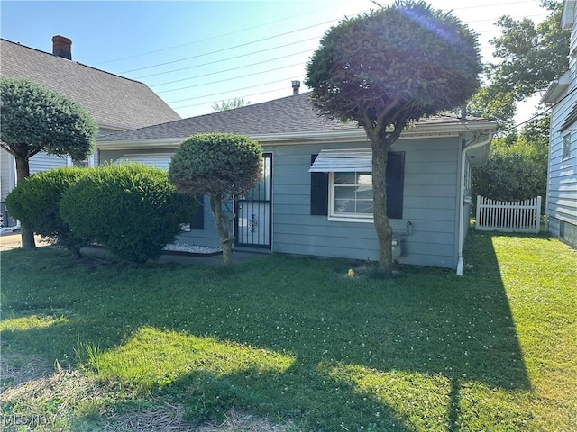4013 E 29th St, Newburgh Heights, OH 44105 - view of front of property with a shingled roof
