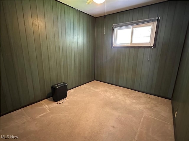 4013 E 29th St, Newburgh Heights, OH 44105 - carpeted spare room featuring wooden walls