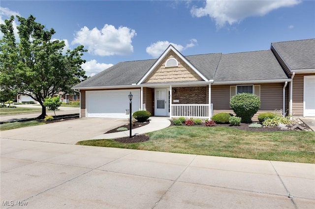 189 Park Place Dr, Wadsworth, OH 44281 - view of front of property with a garage, driveway, a porch, and a front yard