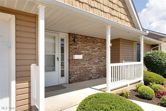 189 Park Place Dr, Wadsworth, OH 44281 - doorway to property with a porch and brick siding