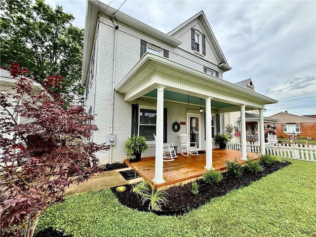 5519 4th Ave, Vienna, WV 26105 - greek revival inspired property featuring covered porch and brick siding