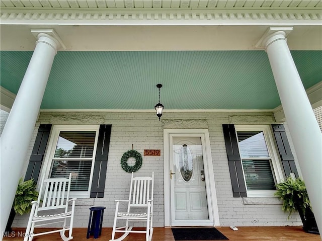5519 4th Ave, Vienna, WV 26105 - entrance to property featuring a porch and brick siding