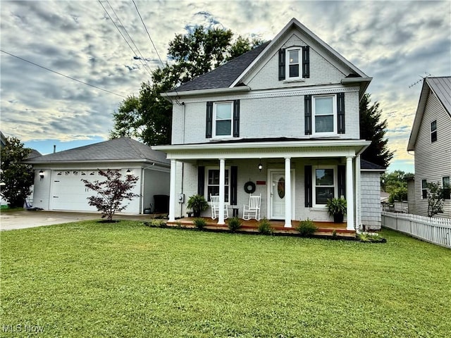5519 4th Ave, Vienna, WV 26105 - view of front facade featuring brick siding, covered porch, concrete driveway, and an attached garage