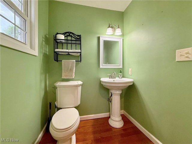 5519 4th Ave, Vienna, WV 26105 - half bath with toilet and wood finished floors