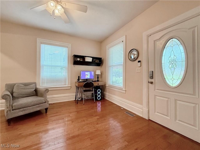 5519 4th Ave, Vienna, WV 26105 - foyer entrance with wood finished floors and a ceiling fan