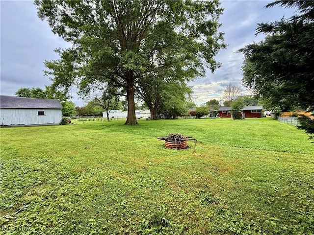 5519 4th Ave, Vienna, WV 26105 - view of green lawn featuring an outdoor fire pit