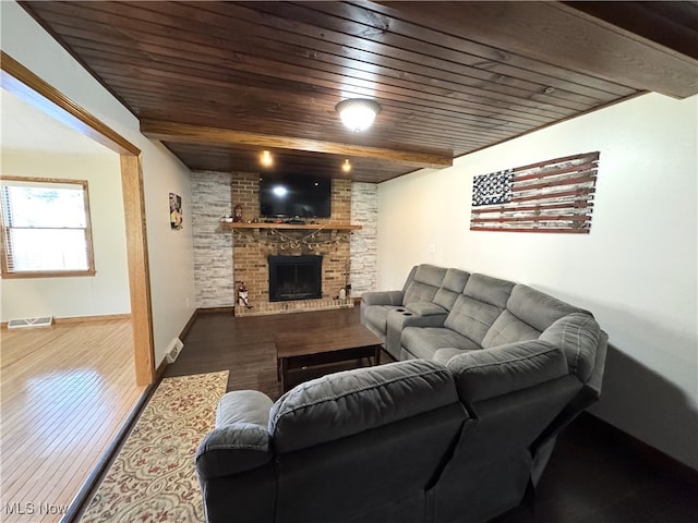607 Wyndclift Cir, Austintown, OH 44515 - living room featuring wood ceiling, a brick fireplace, and wood finished floors