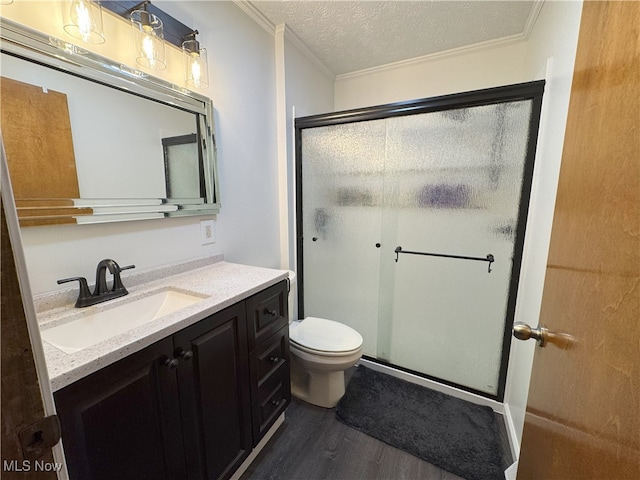 607 Wyndclift Cir, Austintown, OH 44515 - full bath with wood finished floors, crown molding, vanity, a stall shower, and a textured ceiling