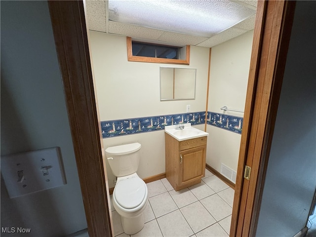 607 Wyndclift Cir, Austintown, OH 44515 - bathroom featuring vanity, tile patterned floors, and a paneled ceiling