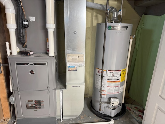 607 Wyndclift Cir, Austintown, OH 44515 - utility room with gas water heater and heating unit