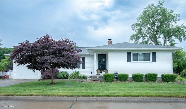 214 1st St, Huron, OH 44839 - view of front of house with a front lawn, a chimney, driveway, and roof with shingles