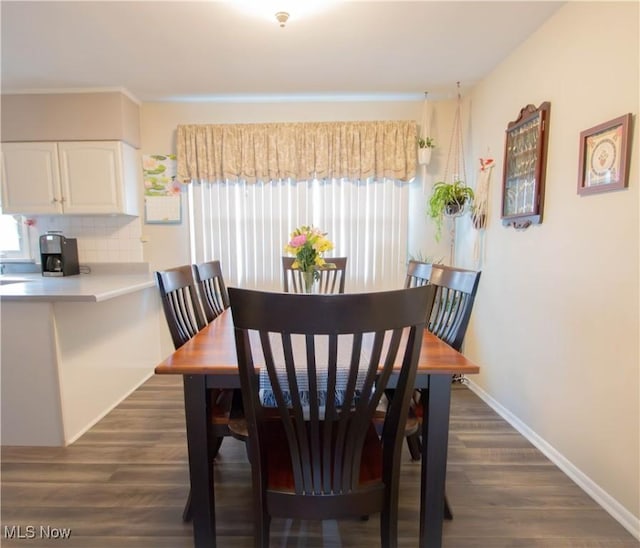 214 1st St, Huron, OH 44839 - dining area featuring plenty of natural light and dark wood finished floors