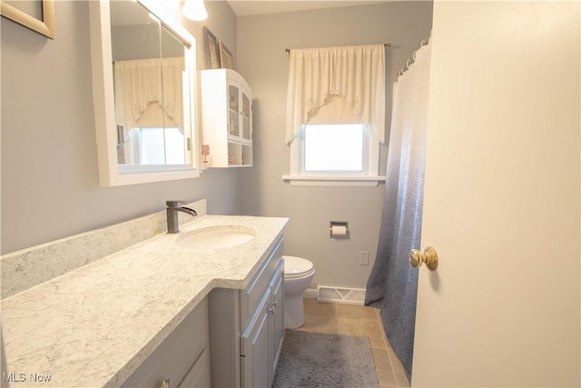 214 1st St, Huron, OH 44839 - bathroom featuring vanity, tile patterned floors, and a shower with shower curtain