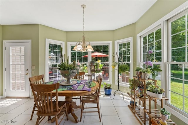 915 Cimarron Oval, Aurora, OH 44202 - sunroom / solarium with tile patterned flooring and a chandelier