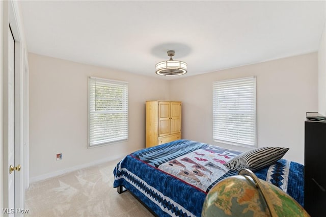 915 Cimarron Oval, Aurora, OH 44202 - bedroom featuring carpet and baseboards