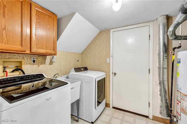 9543 Ridge Ct, Twinsburg, OH 44087 - laundry area featuring cabinet space, washer and dryer, light flooring, and water heater