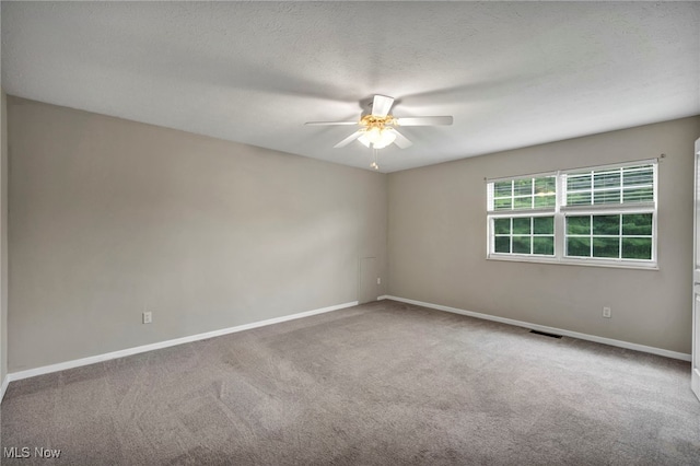 9543 Ridge Ct, Twinsburg, OH 44087 - spare room with a ceiling fan and carpet floors