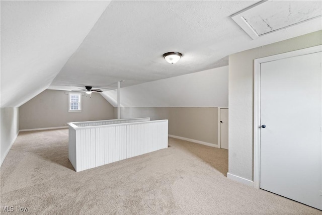 2016 Spring Ave NE, Canton, OH 44714 - bonus room with light colored carpet, lofted ceiling, ceiling fan, and attic access