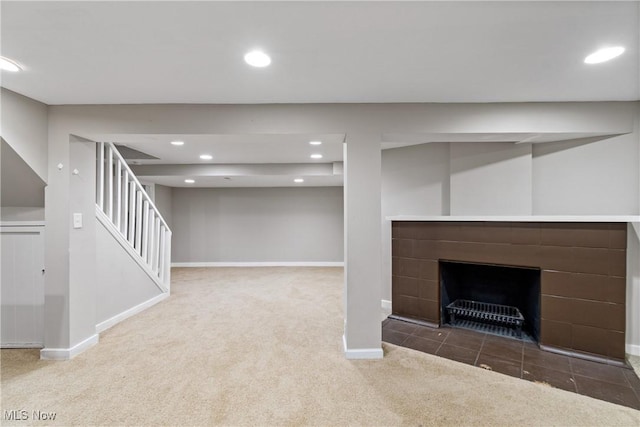 2016 Spring Ave NE, Canton, OH 44714 - finished basement featuring carpet floors, stairway, recessed lighting, and a tile fireplace