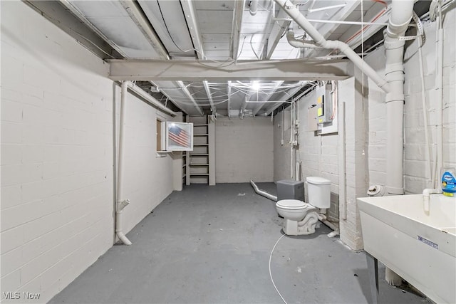 2016 Spring Ave NE, Canton, OH 44714 - unfinished basement with a sink and concrete block wall