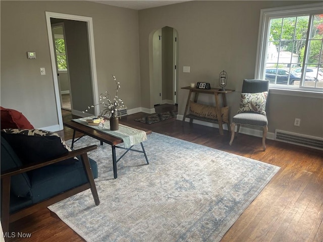 2016 Spring Ave NE, Canton, OH 44714 - living area with arched walkways and wood finished floors