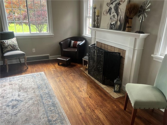 2016 Spring Ave NE, Canton, OH 44714 - living area with wood finished floors and a tiled fireplace