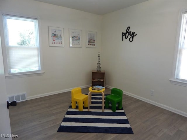 6012 Sunderland Dr, Parma, OH 44129 - rec room with wood finished floors and baseboards