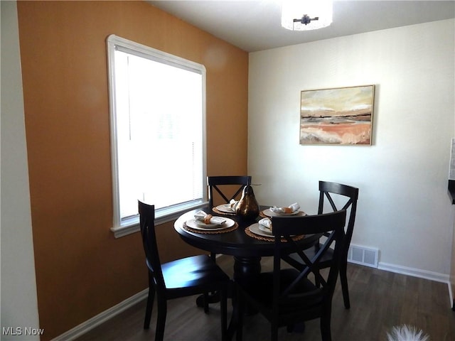 6012 Sunderland Dr, Parma, OH 44129 - dining space with wood finished floors and baseboards