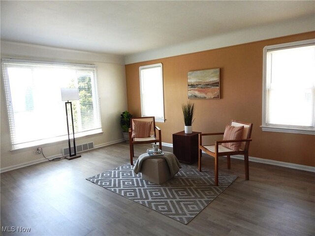 6012 Sunderland Dr, Parma, OH 44129 - living area featuring wood finished floors and baseboards