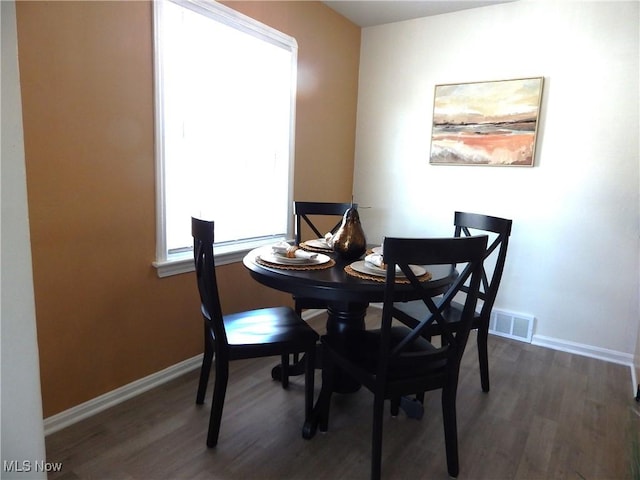 6012 Sunderland Dr, Parma, OH 44129 - dining space with wood finished floors and baseboards