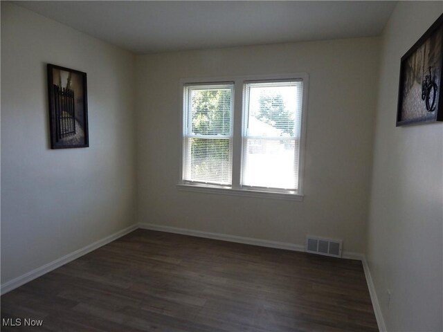 6012 Sunderland Dr, Parma, OH 44129 - empty room featuring dark wood-type flooring