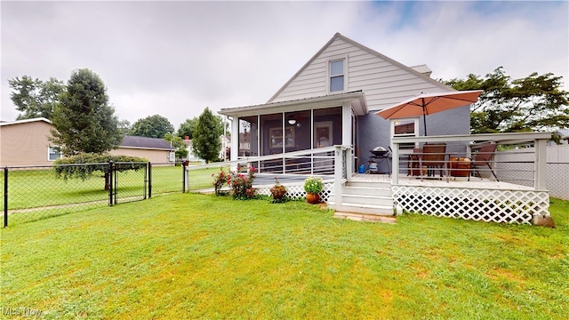 500 Elm St, Belpre, OH 45714 - rear view of property with a gate, a sunroom, and a wooden deck
