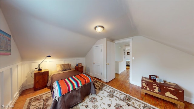 500 Elm St, Belpre, OH 45714 - bedroom with light wood-style flooring and lofted ceiling