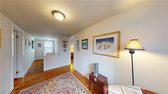 500 Elm St, Belpre, OH 45714 - hall featuring wood finished floors and attic access