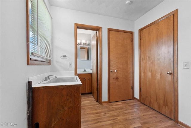 4130 Atwood Ave SE, Canton, OH 44707 - bathroom featuring vanity and wood finished floors
