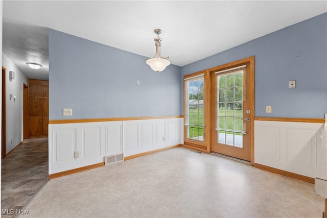 4130 Atwood Ave SE, Canton, OH 44707 - unfurnished room with a wainscoted wall and a decorative wall
