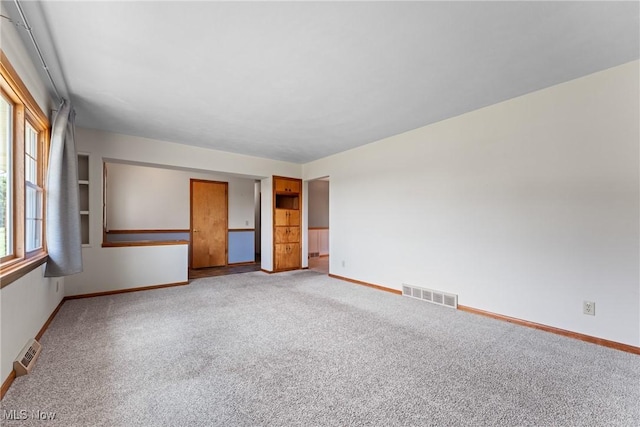 4130 Atwood Ave SE, Canton, OH 44707 - carpeted empty room with baseboards