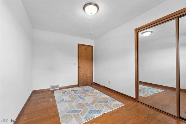 4130 Atwood Ave SE, Canton, OH 44707 - empty room featuring wood finished floors and baseboards