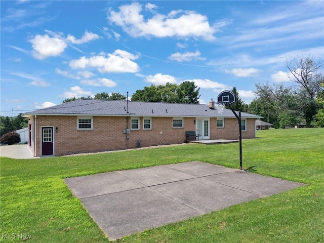 4130 Atwood Ave SE, Canton, OH 44707 - back of property with a yard, a patio, brick siding, and french doors