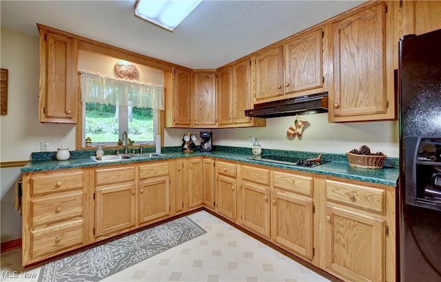 5882 Crooked Run Rd SW, New Philadelphia, OH 44663 - kitchen with black appliances, under cabinet range hood, dark countertops, and light floors