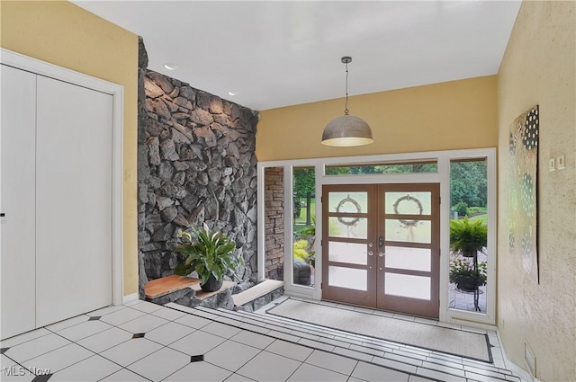 889 Eaton Ave, Akron, OH 44303 - tiled entryway with french doors