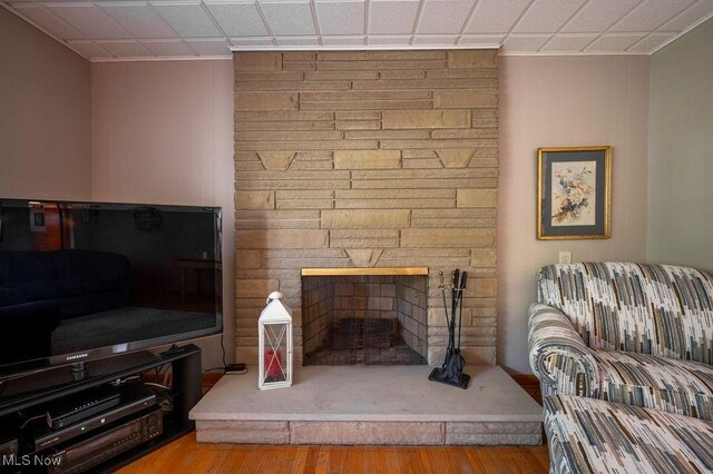 3800 7th Ave, Vienna, WV 26105 - living room with a fireplace, wood finished floors, and crown molding