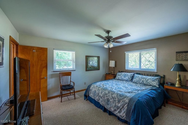 3800 7th Ave, Vienna, WV 26105 - carpeted bedroom featuring multiple windows and a ceiling fan
