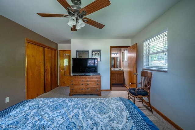 3800 7th Ave, Vienna, WV 26105 - carpeted bedroom featuring ensuite bathroom, a closet, and a ceiling fan