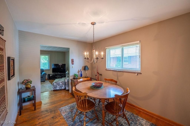 3800 7th Ave, Vienna, WV 26105 - dining space with wood finished floors and a chandelier
