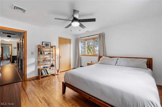 903 Robinson Ave, Barberton, OH 44203 - bedroom with light wood-style flooring and a ceiling fan