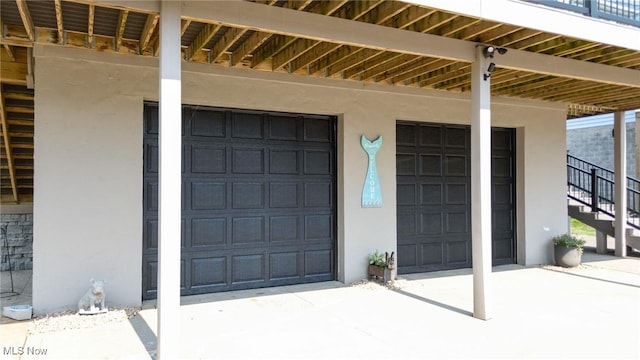 31 Anns Dr, Vienna, WV 26105 - entrance to property featuring stucco siding and an attached garage