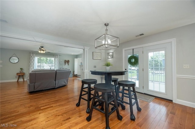 31 Anns Dr, Vienna, WV 26105 - dining space with a chandelier and light wood-type flooring