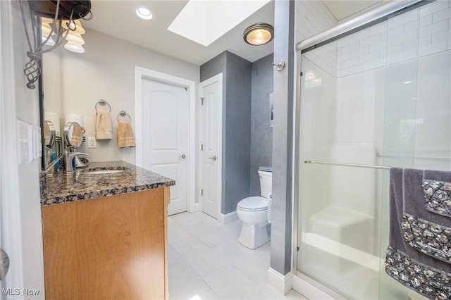 31 Anns Dr, Vienna, WV 26105 - full bath with vanity, a skylight, a stall shower, tile patterned flooring, and recessed lighting